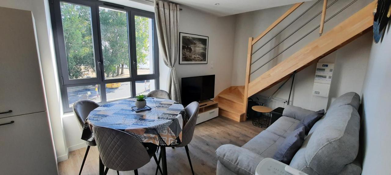 Les Appartements De La B Saint-Benoit-des-Ondes Exterior photo